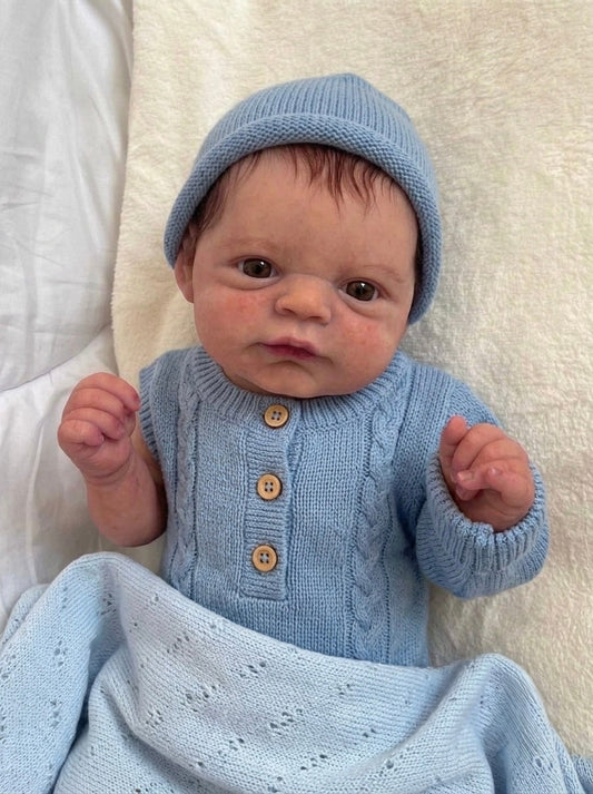 Muñeco Reborn Realista Ryan Ojos abiertos Niño 50cm y 1.700 kg + Pack Premium